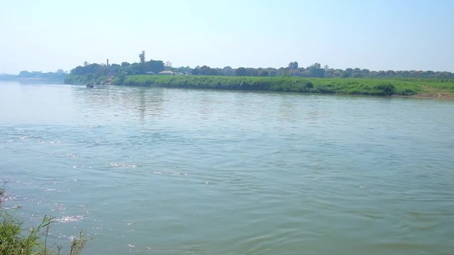 The ferry service on Myitnge (Dokhtawaddy, Nam Tu) river between the ancient Ava (Inwa) city on island and Mandalay, Myanmar.