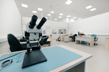 Industrial optical microscope. Workplace for quality control of electronic circuit boards