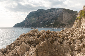 Fototapeta na wymiar View of Capri island (Italy), with many boats on the water