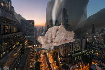 Group businessmen join hands for working. symbolizing the hands to unity and teamwork. in the...