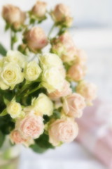 Blure effect, soft focus. Bouquet of pale pink roses. Beautiful Holiday background. 