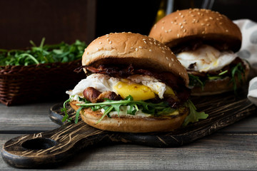 Burger with bacon and poached egg