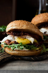 Burger with bacon and poached egg