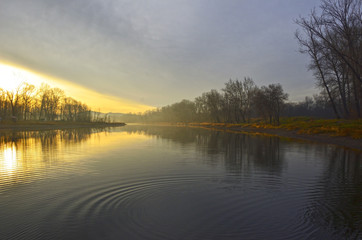 sunset on the banks of the river in autumn. Russia. Siberia