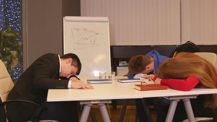 Businessmen asleep at a meeting in the office - Powered by Adobe