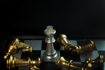 gold and silver chess on board close up image abstract Background.