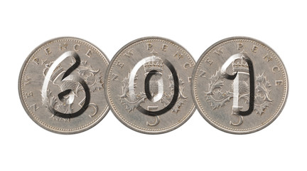 Number 601  with old coins on white background