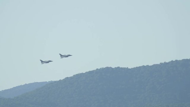 Two jet planes flying during an air show