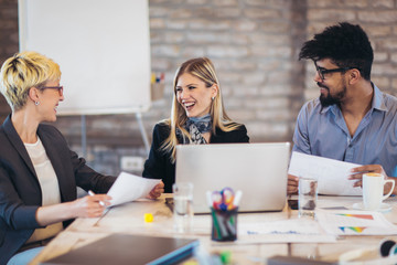 Business people working in office together. Team work in office.
