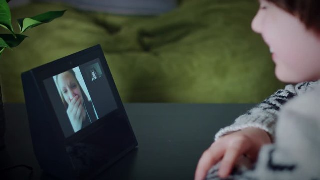 4K Child Boy Talking with his Mom on Smart Home Device