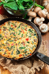 Frittata made of eggs, mushrooms and spinach