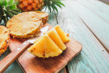 pineapple on the wood texture background
