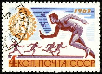 Ukraine - circa 2018: A postage stamp printed in USSR show Relay racing. Series: 8th Trade Unions Summer Spartakiad. Circa 1965.