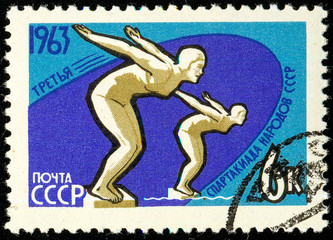 Ukraine - circa 2018: A postage stamp printed in USSR show Swimming. Series: Third Soviet People's Spartakiad. Circa 1963.