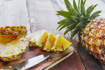 pineapple on the wood texture background
