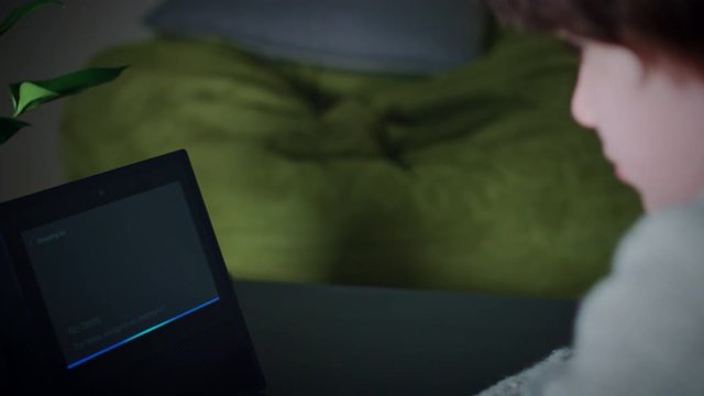 4K Child Boy Creating Shopping List on Smart Home Device