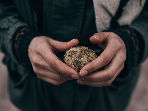 Close-up hands with conch