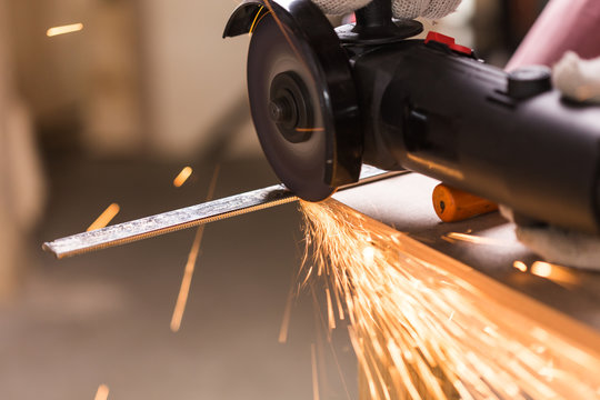 Sparks during cutting of metal angle grinder