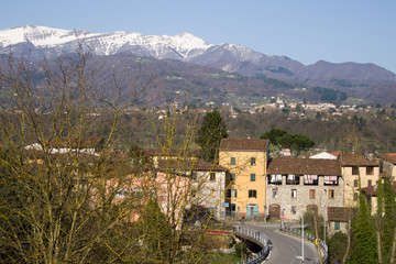 Fototapeta premium Garfgnana, Italy, viewed from Ponte di Campi. Apuan Alps behind.