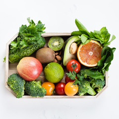 Healthy Food Clean Concept. Raw fruits, Vegetables, Nuts, Cereals in wooden Tray on Concrete Stone Table Background. Top view