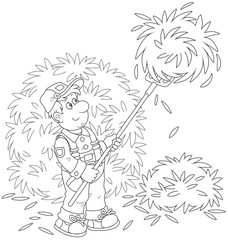 Smiling farmer tedding hay with a pitchfork in a hayloft, a black and white vector illustration in a cartoon style for a coloring book