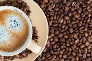 Fototapeta premium Cup of coffee and coffee beans