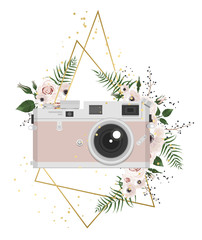 Vintage retro photo camera in flowers, leaves, branches on white background