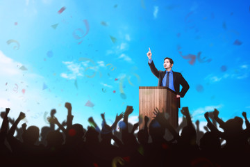 Handsome asian businessman giving a talk on business conference