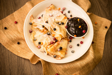 Powdered sugar on pancake dish