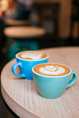Two cups of cappuccino