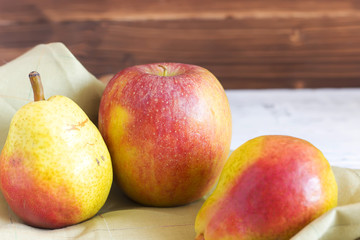 fresh pears on wooden background