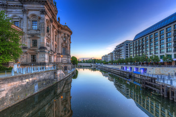 Architecture of Berlin reflected in Spree River, Germany