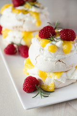Double sweet pavlova with raspberries