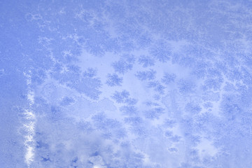 purple frozen car window textured with ice pattern