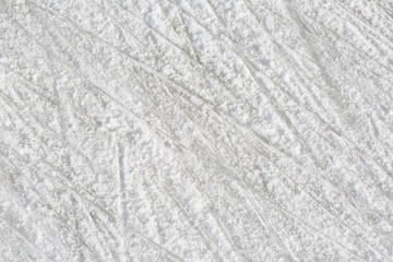 skating traces on the ice in snow