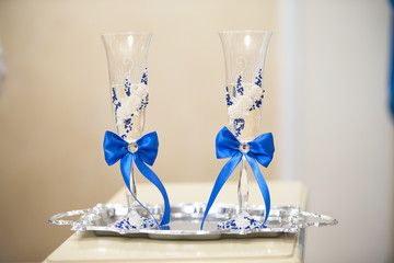Champagne glasses are beautifully decorated. Two beautiful glasses.