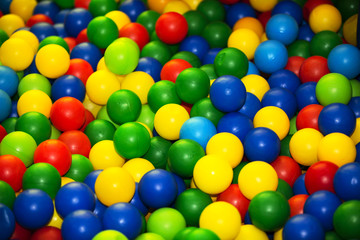 Fototapeta na wymiar Plastic multi-colored balls. Many balls