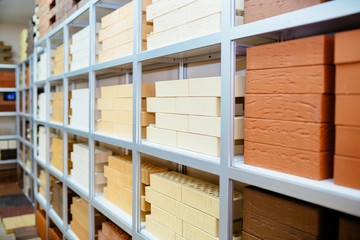 Racks with brick. Brick background, brick, brickwork, cement, concrete.