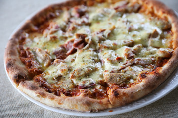 Pizza ham bacon with cheese and tomato sauce
