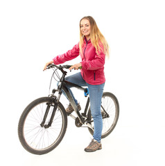 Fototapeta na wymiar Girl in jeans on a bicycle on a white background.