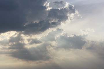 grey clouds and rays of light
