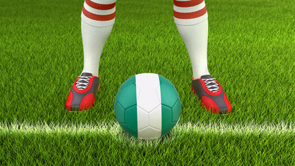 Fototapeta na wymiar Man and soccer ball with Nigerian flag 