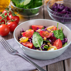 Spinach salad with chickpeas and veggies, healthy food, vegetarian and vegan snack, clean eating, diet, detox