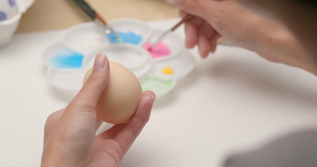 Obraz na płótnie Canvas Easter holiday with painting egg