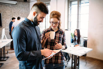 Portrait of architects having discussion in office