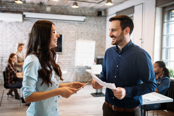 Portrait of architects having discussion in office