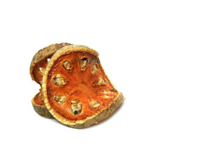 Dry Bael Fruit isolated on a white background.