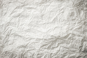 Background of crumpled white gray monochrome bakery paper