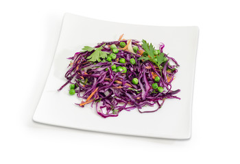 Salad of chopped red cabbage and other vegetables on dish