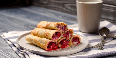 Pancakes with raspberries close-up